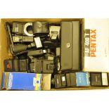 A large collection of flash units, to include Pentax, Voigtlander, Minolta and other examples (two