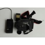 A JVC cam corder, Compact VHS videomovie GR-AX35, battery charger etc in canvas carry bag