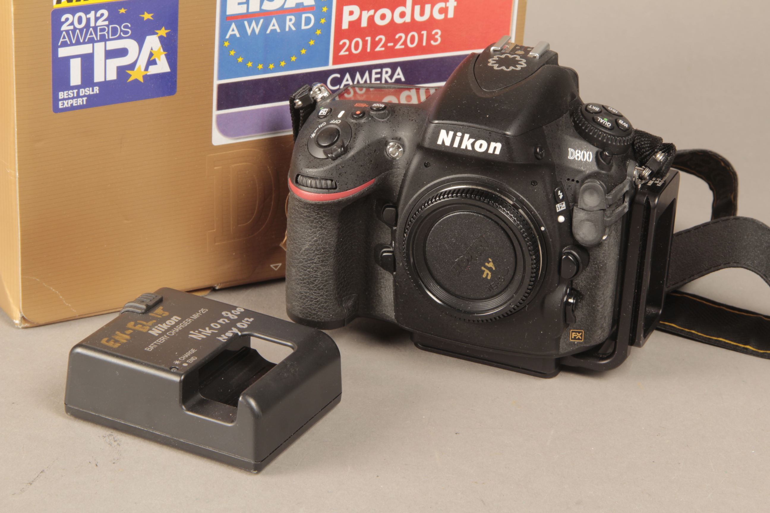 A Nikon D800 body, with charger and maker's box