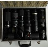 A quantity of lenses, to include Tokina, Sigma etc in aluminium carrying case