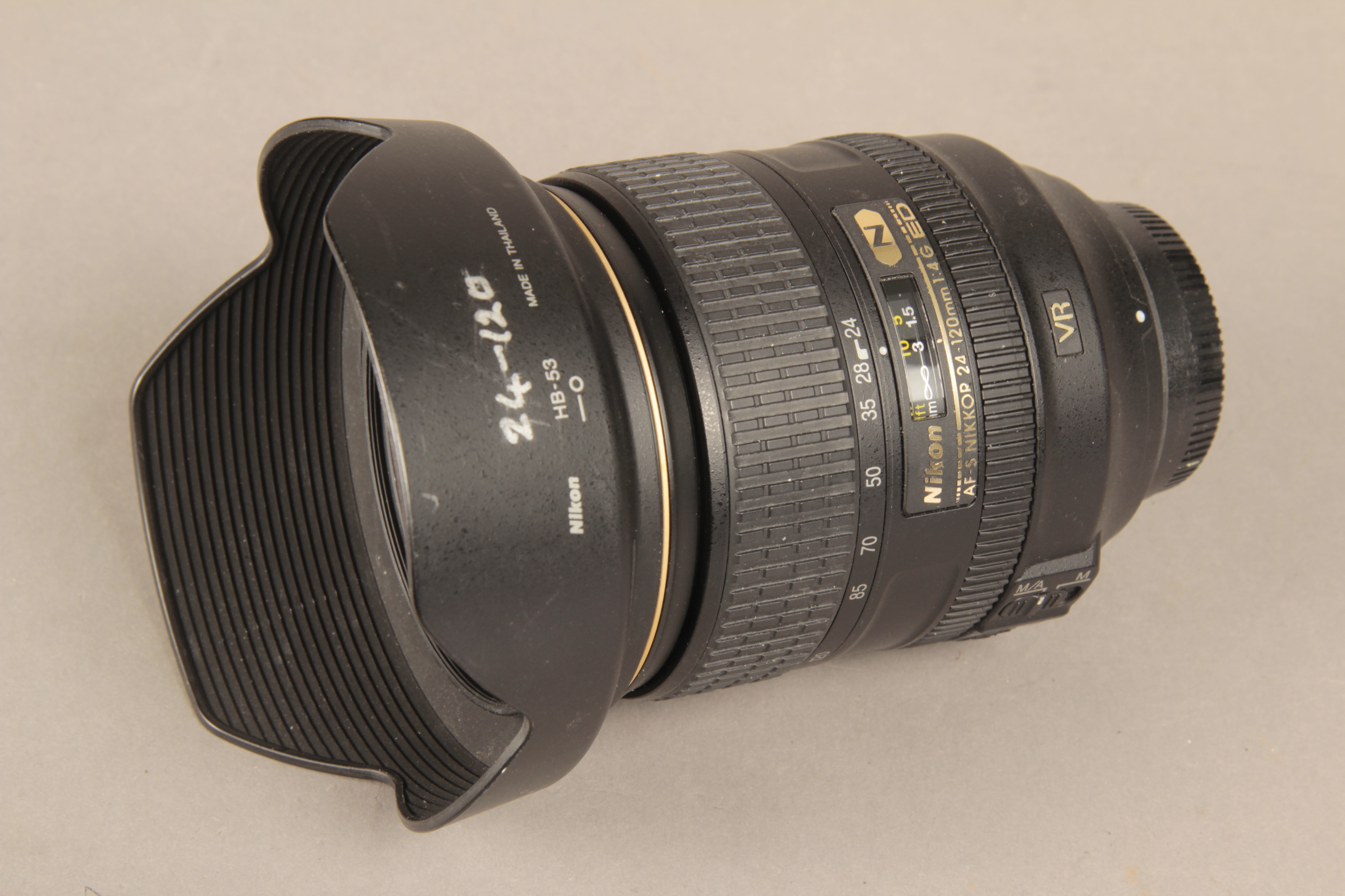 A Nikon AF-S 24-120 Lens, SWM VR ED IF Aspherical F4 model with lenshood,