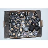 A collection of camera and enlarger lenses, to include Pentacon, Zenit, Ricoh, Wray, Braun etc