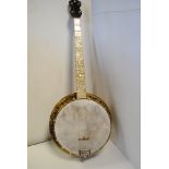 Banjo, four string resonator banjo, 19 fret finger board with simulated mother of pearl