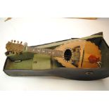 Mandolin, a 'Maidstone' eight string in reasonable condition missing strings in hard case