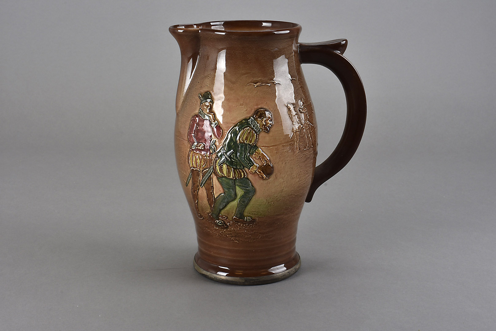 A Royal Doulton Series ware jug, depicting Sir Walter Raleigh playing bowls as the Armada comes into