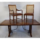 A modern hardwood dining table, and six matching chairs including two carvers, the rectangular