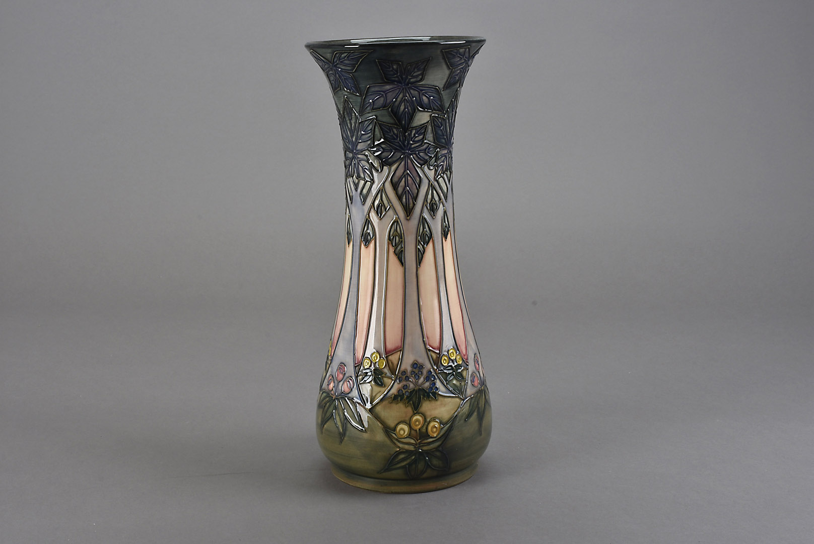 A Moorcroft Pottery vase, of trumpet form and in the Cluny pattern by Sally Tuffin 31 cm H