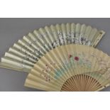 A Japanese shibayama ivory fan, decorated with insects 27 cm L, plus a larger bone example with gilt