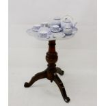 A Royal Worcester part tea set, on porcelain lobed tray table mounted on later tripod base c.1880,