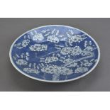 A 19th century Chinese porcelain charger, decorated in the cracked ice and prunus pattern , with