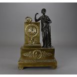 An Empire figural mantel clock by Jean-François Deninger (1775-1866), better known as Deniere of