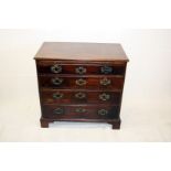 A 19th Century and later mahogany bachelor chest of drawers, having brushing slide over four