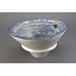 A 19th century ceramic transfer printed toilet bowl, marked 'Oriental' to one side though devoid