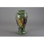 A Moorcroft Pottery vase, of baluster form in the Rainforest pattern by Sally Tuffin 1994, with