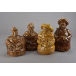 A collection of novelty Sadler storage jars, modelled as figures representing the various
