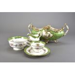 A Coalport six place setting tea service, decorated with floral sprays and swags against a white and