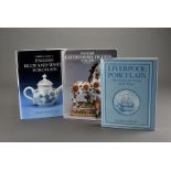 A collection of antiques reference books, including Godden's English Blue and White Porcelain,