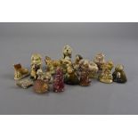 A large collection of Wade Whimsies, mainly animal figures, including dogs, hogs, cats, otters, deer