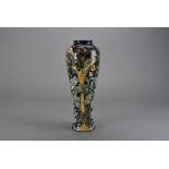 A Moorcroft Pottery Limited Edition vase, of elongated baluster form and decorated in the c. 1995