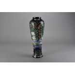 A Moorcroft Pottery Limited Edition vase, of elongated baluster form and decorated in the c. 2000