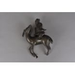A 19th century Chinese bronze figure group, of a deity riding a deer, sometimes depicted over temple