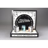A Jean Paul Gaultier musical shop display, the card display with the design of musical notes and