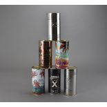 A collection of Jean Paul Gaultier perfume bottle cases, all modelled as tin cans, various ranges