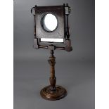 William IV mahogany shaving mirror, the hinged rectangular mirror with lacquered brass fittings and