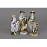 A 19th century Sitzendorf figure group, of a young gentleman in 18th century dress with a lamb, a