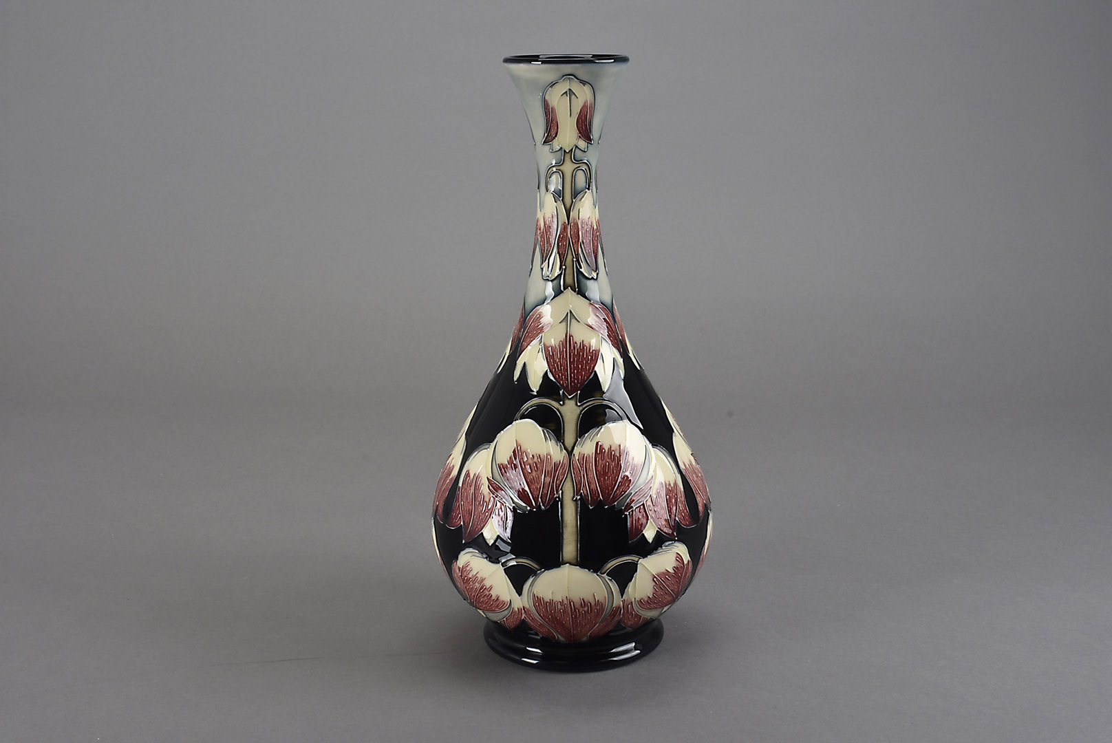 A Moorcroft Pottery Limited Edition vase, of elongated bottle form and decorated in the Desert Ivory