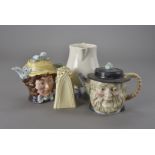 Two Beswick character tea pots, Dolly Varden and Peggotty, plus Carltonware Lustre Pottery novelty