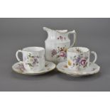 A matched 12 setting Derby Posies part coffee set, comprising 12 cups and saucers, and a milk jug (