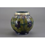A Moorcroft Pottery vase, of spherical form and decorated in the Glasgow School style with