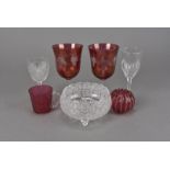 A small collection of 19th century and later glass, including a cranberry glass vase, a pair of