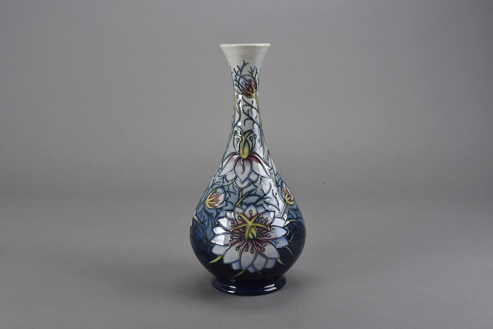 A Moorcroft Pottery Limited Edition vase, of elongated bottle form and decorated in the Love in a