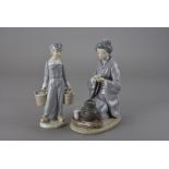 A Lladro figure group Tea Ceremony August Moon, of a Geisha performing the traditional ceremony 23