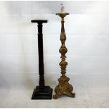 A William IV mahogany torchere, the column support on sloping square base supporting square top, 138
