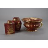 A Carltonware Rouge Royale tea caddy, ginger jar and cover, and campagna vase, all with gilt