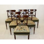 A set of six early 19th century mahogany cross back dining chairs, the reeded back rails with X