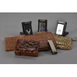 A two vintage leather wallets, a Victorian leather cigar, stamp and aide memoire wallet dated
