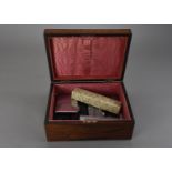 A 19th century rosewood box, containing a selection of lighters, two cased Parker ball point pen and
