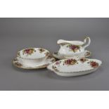 A collection of Royal Albert Old Country Rose dinner and tea ware, including five cups, six saucers,