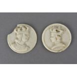 A pair of carved bone tokens, or decorative bosses, depicting a king and queen, each 1½ in (38 mm)