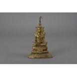 A Burmese gilt bronze Buddha, seated in the Bhumisparsha Mudra on lotus leaf base with cockerel sash