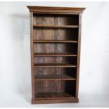 A Late Victorian oak open bookcase, in dark finish with adjustable shelves 114.5 cm W x 205 cm H