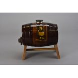 A Royal Doulton series ware spirit barrel, with 800 grade silver mounts and decorated with scenes of