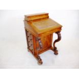 A Victorian walnut Davenport desk, with maple lined well, missing stationary dividers 56 cm W x 59