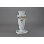 An early 20th century latte glass vase, hand decorated with floral sprays and borders 33.5 cm H