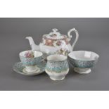 A six setting Royal Albert Enchantment pattern tea set, comprising seven cups, nine saucers, seven