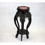 A 19th Century Chinese hardwood and marble top plant stand, of hexagonal shape, with decorated apple